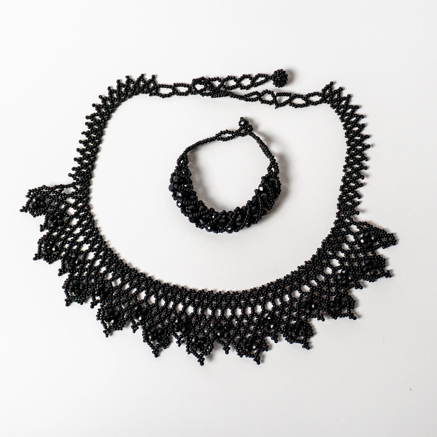 black huichol beaded necklace and bracelet set handcrafted chaquira jewelry.