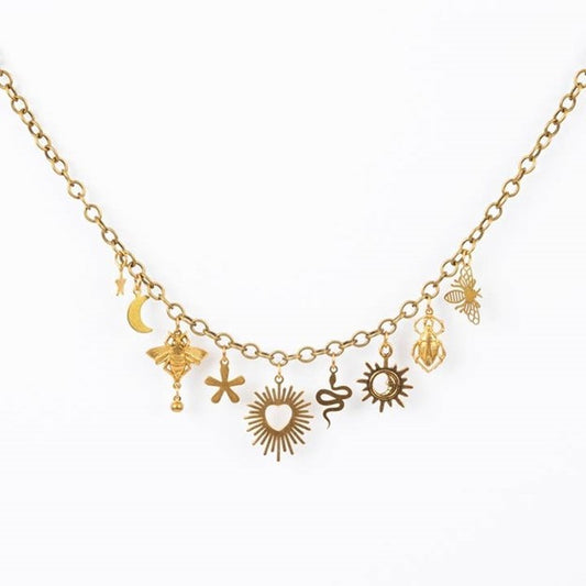Nature-inspired charm necklace with brass sun, moon, and insect charms handmade in Guatemala