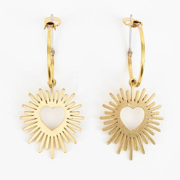 Gold brass hoop earrings with heart and sunburst design on a white background