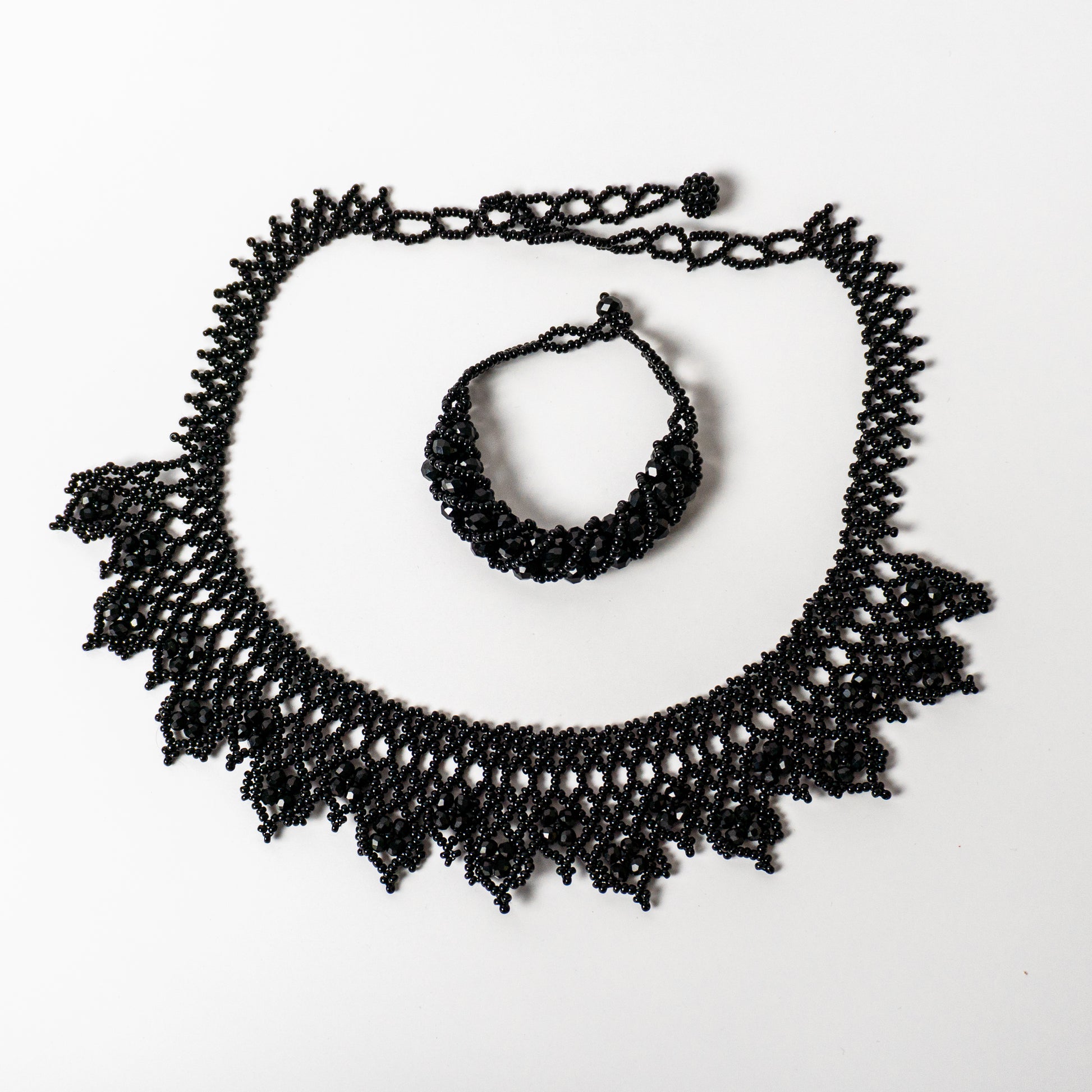 black huichol beaded necklace and bracelet set handcrafted chaquira jewelry.