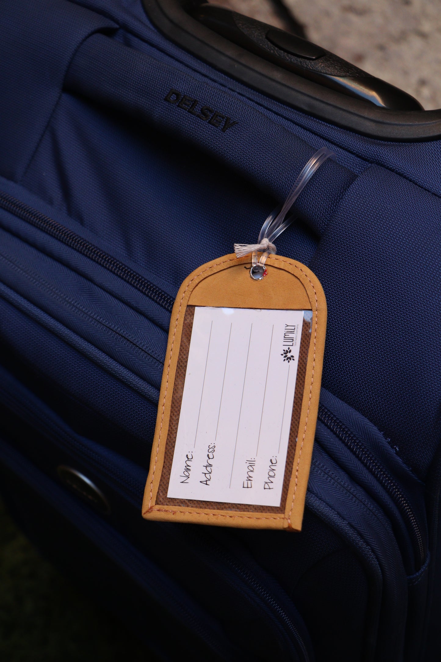 Handwoven luggage tag handmade from traditional Huipil textiles in Guatemala with a sturdy plastic latch that secures your luggage and includes and information card to keep your belongings identifiable.
